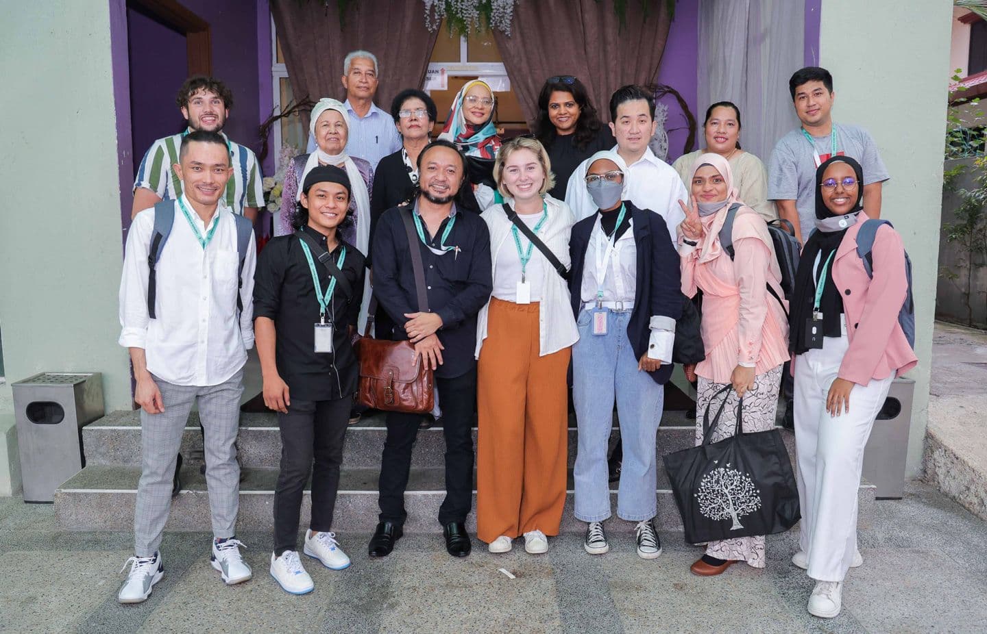 A group of staff and volunteers standing together for a photograph.